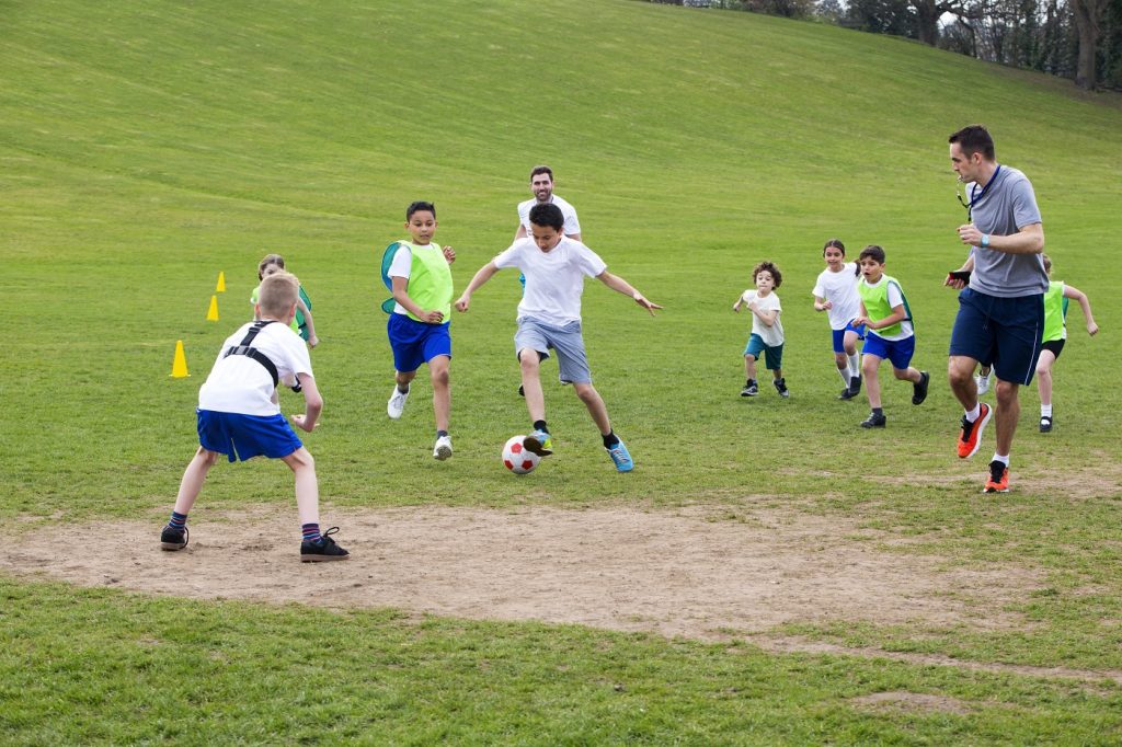 Children playing soccer