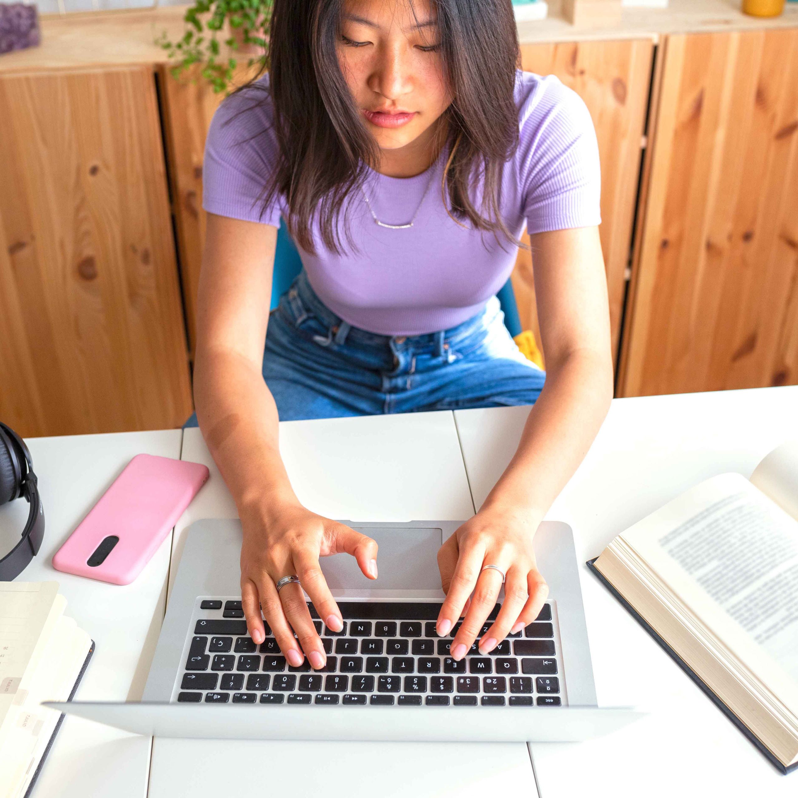 female student doing homework online