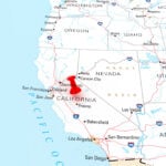 A red tack is over the state of California